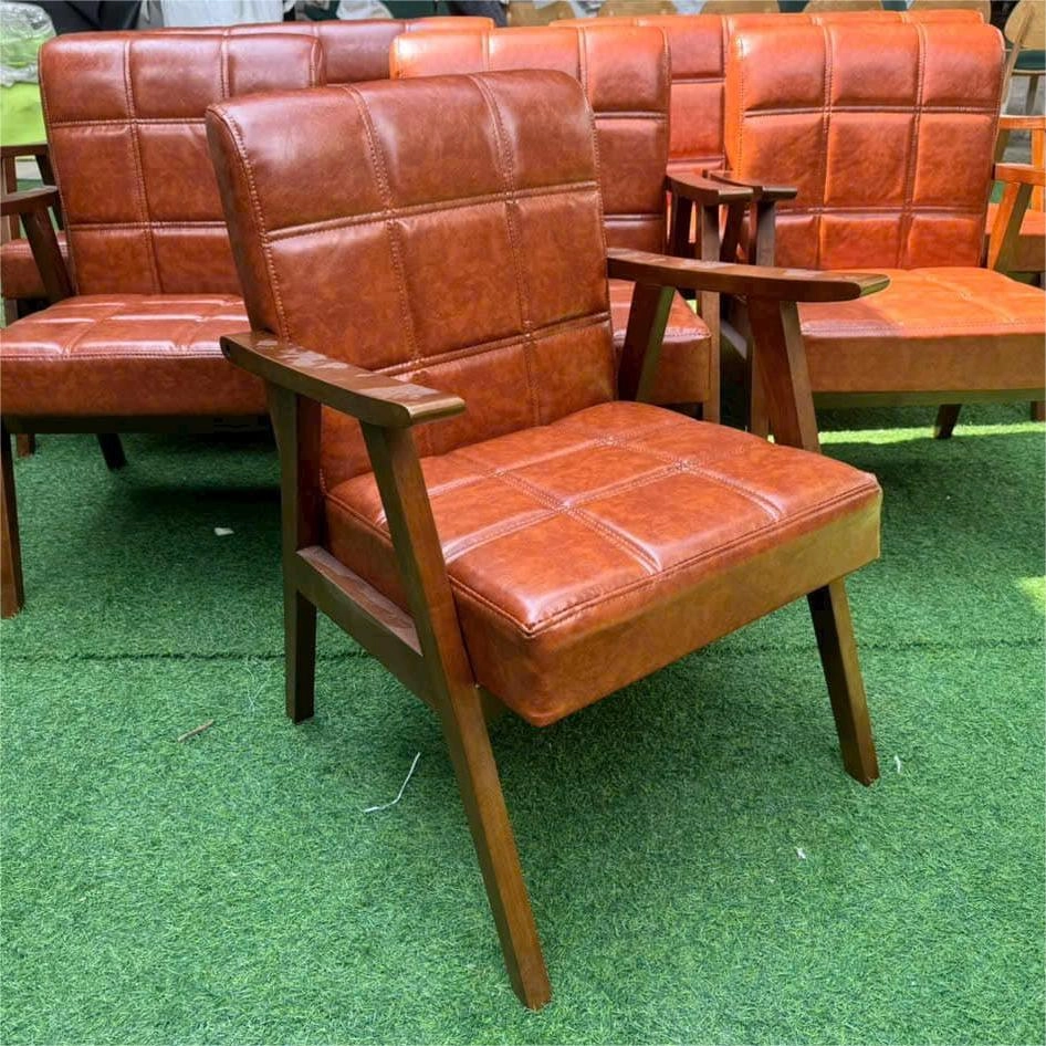 Ghế sofa cafe đơn chân dẹp nệm da nhấn nút