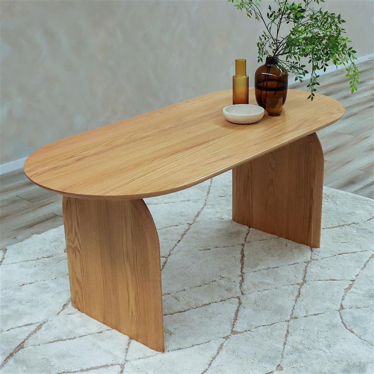 Bàn ăn Oval gỗ tần bì